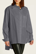 Side pose of model wearing white Cotton Kool Shirt – relaxed-fit, lightweight cotton blouse from Planet by Lauren G.