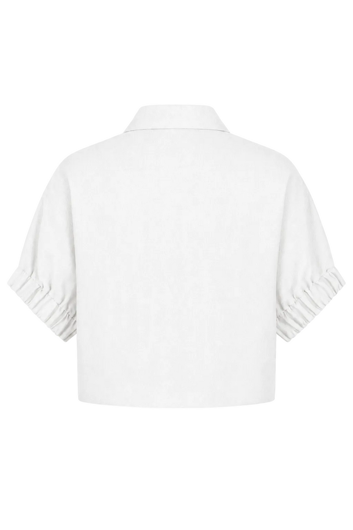 100% linen White short-sleeve cropped shirt with pleated ruffled cuffs, shown from the back on a plain white background.