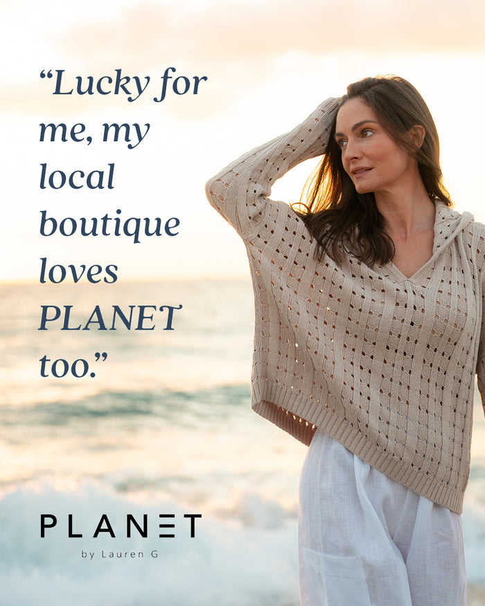 Woman wearing a beige sweater with text overlay and 'PLANET' branding.