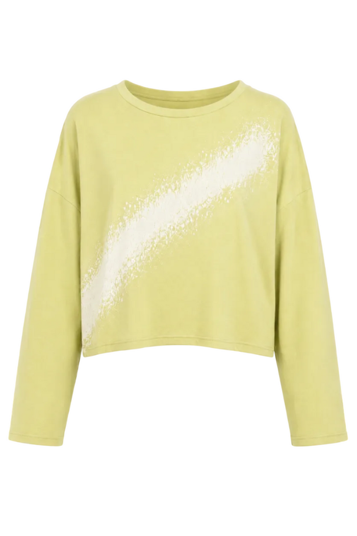 Yellow pima cotton shirt with a white diagonal stripe on a white background